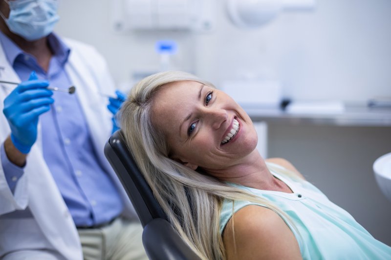 A happy female patient getting ready for her oral and maxillofacial surgery.
